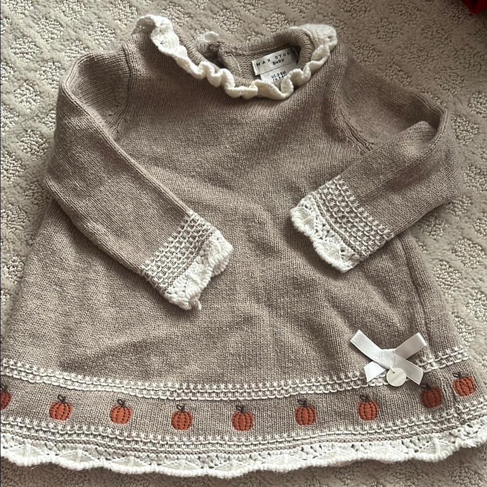 Gray long sleeve sweater dress with mock neck and cuffed sleeves